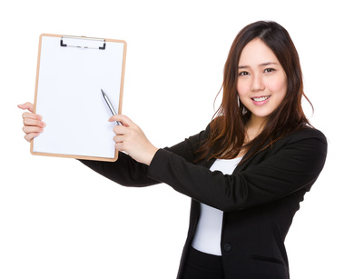Asian businesswoman pen point to clipboard with blank paper